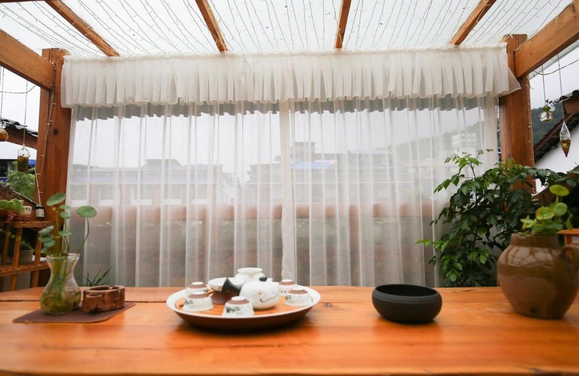 Hotel Tea House Zhangjiajie Esterno foto